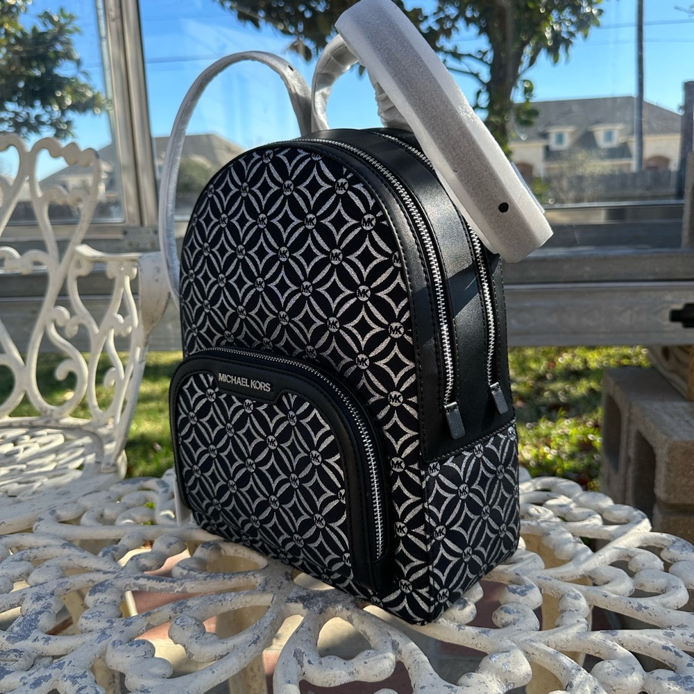 Michael Kors Black and silver Patterned Backpack and wallet - Picture 10 of 12